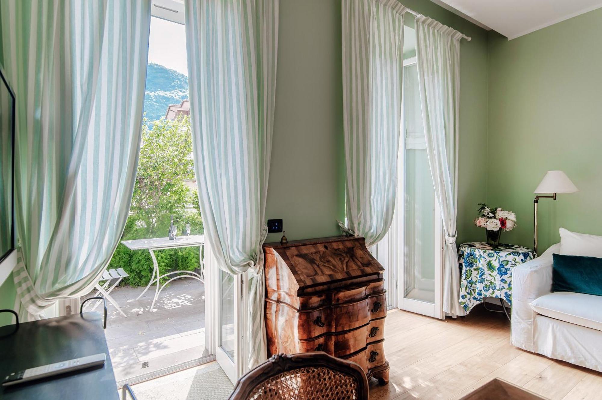 Green Home 65 - The House Of Travelers Комо Екстериор снимка